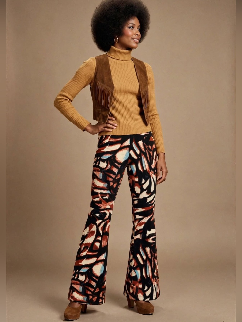 Anthropologie Abstract Print Flare Pants in Rust, Black & Cream